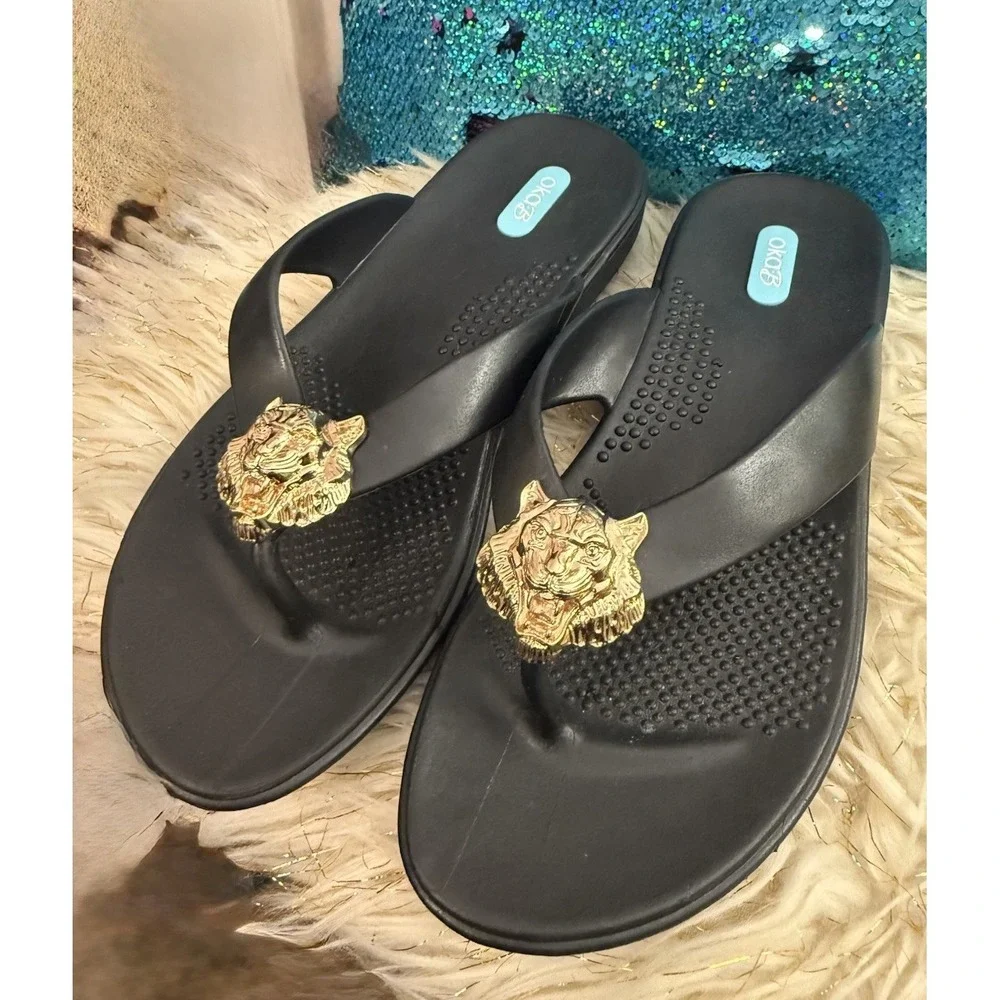 New Okab Black Licorice Gold Lion Head Rubber Flip Flop Thong Sandals Womens M/L